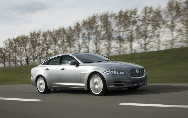 2010-jaguar-XJ-fort-myers-marazzi-motors-passenger-side-front-three-quarter-in-motion.jpg