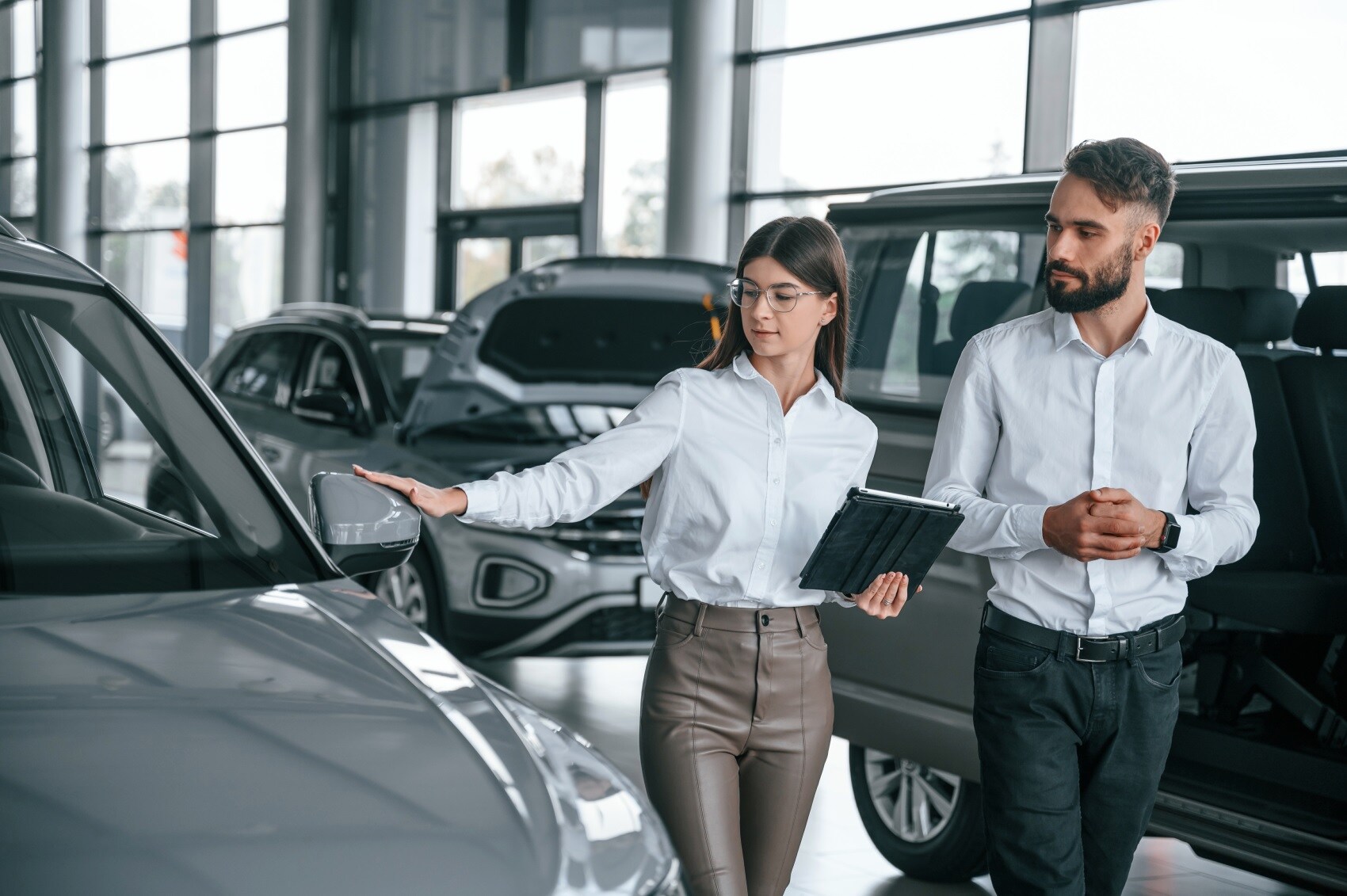 Nissan salesperson with customer