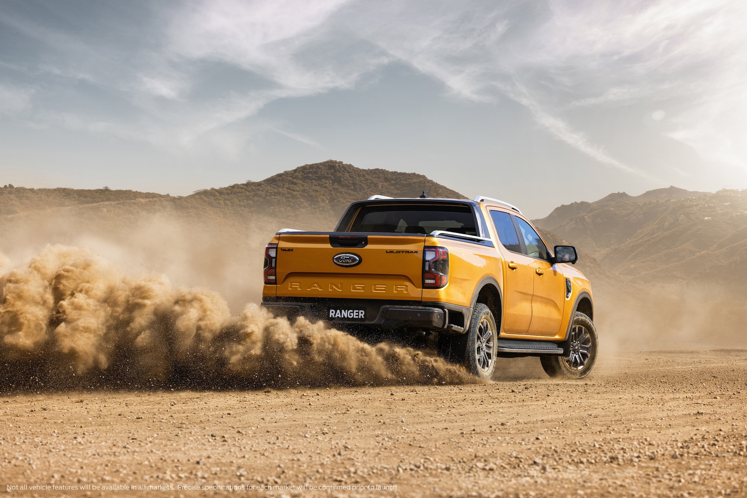 NextGenRanger_Wildtrak_Rear 3QTR_motion_sand2.jpg