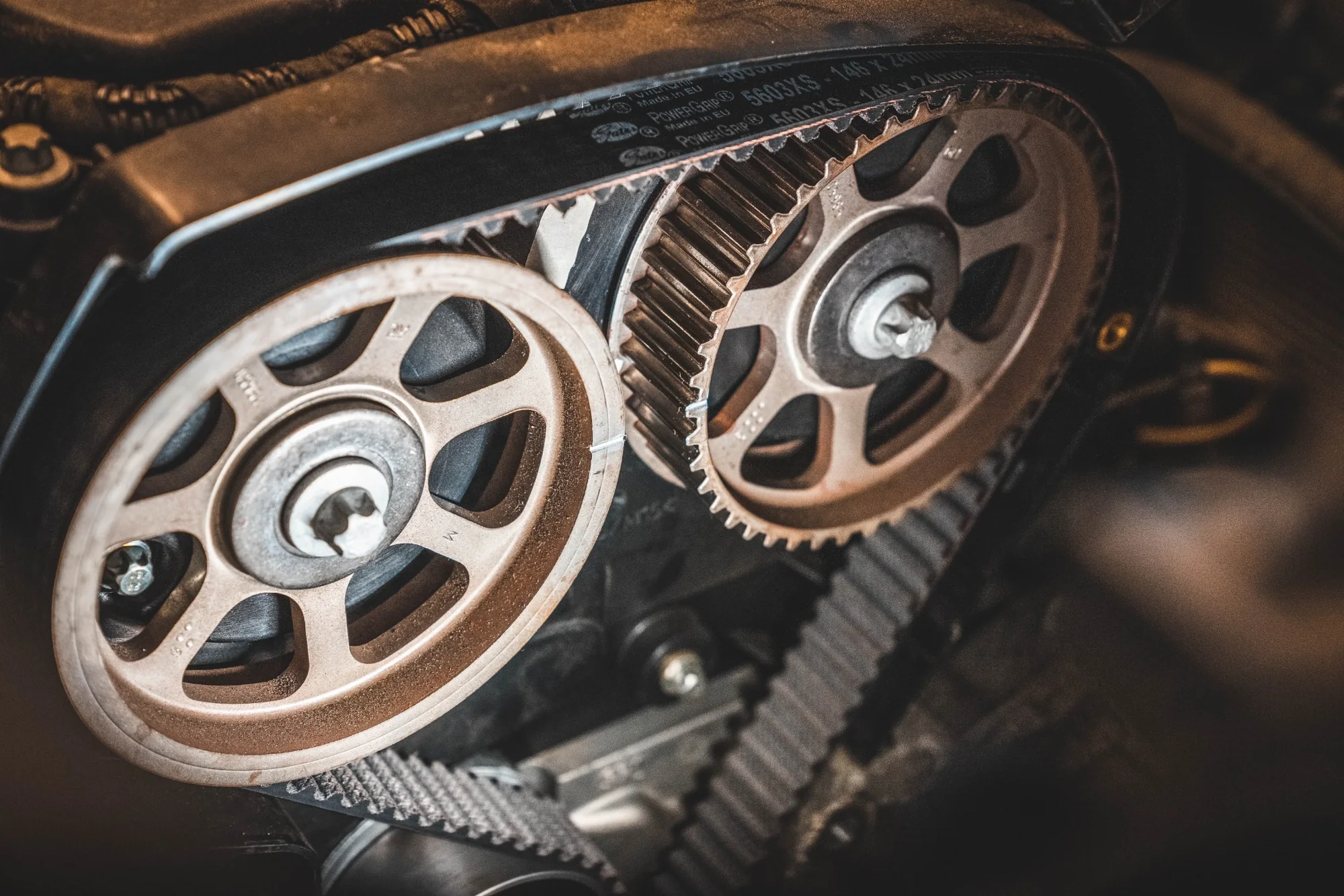 Acura V6 Timing Belt Replacement Acura service technician performing V6 timing belt replacement