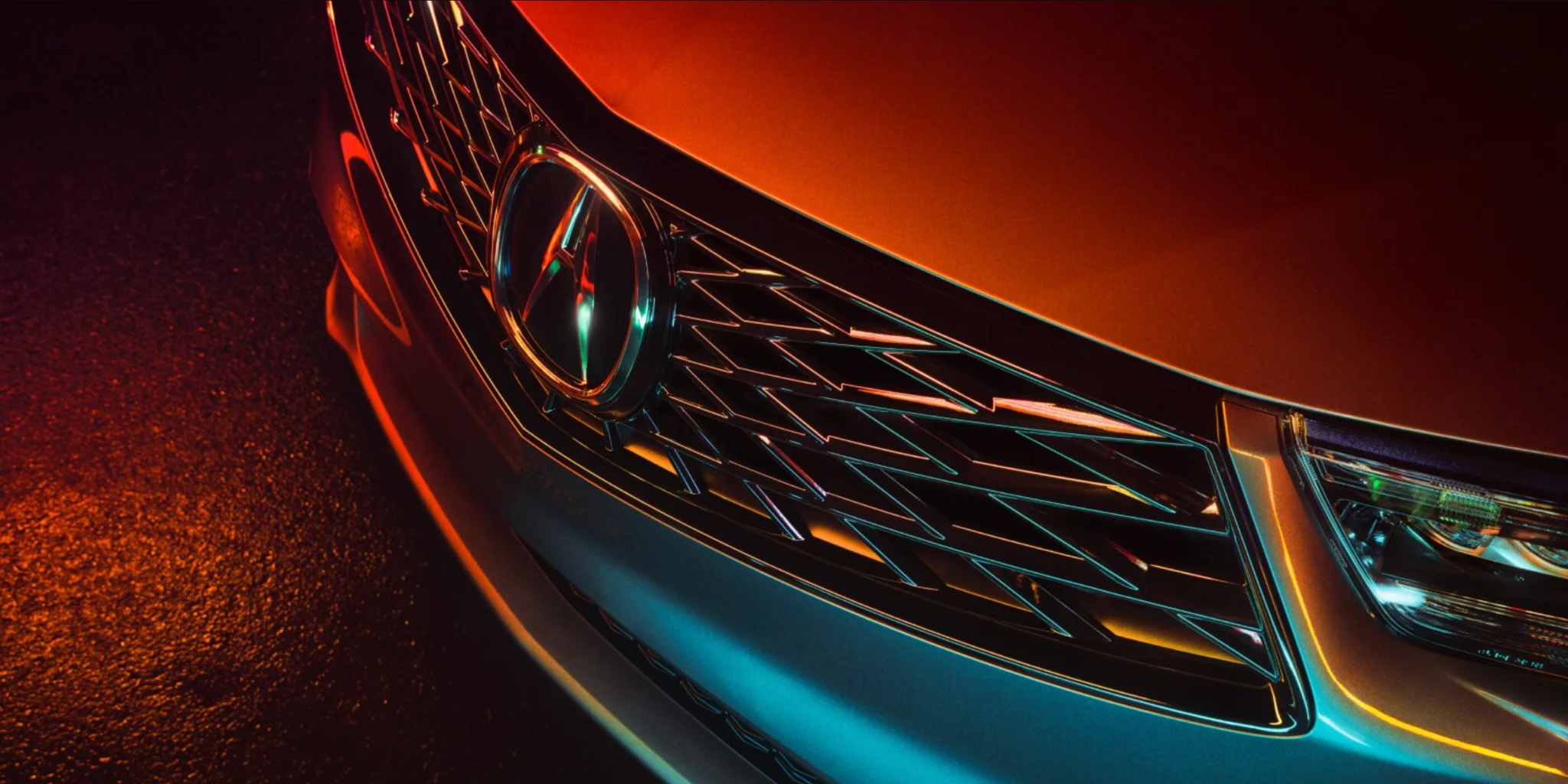 2026 Acura RDX Diamond Pentagon Grille Close-up of the 2026 Acura RDX Diamond Pentagon grille and Acura emblem