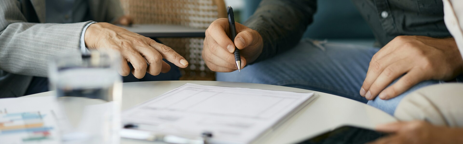 man signing paper for buying vehicle.png man signing paper for buying vehicle