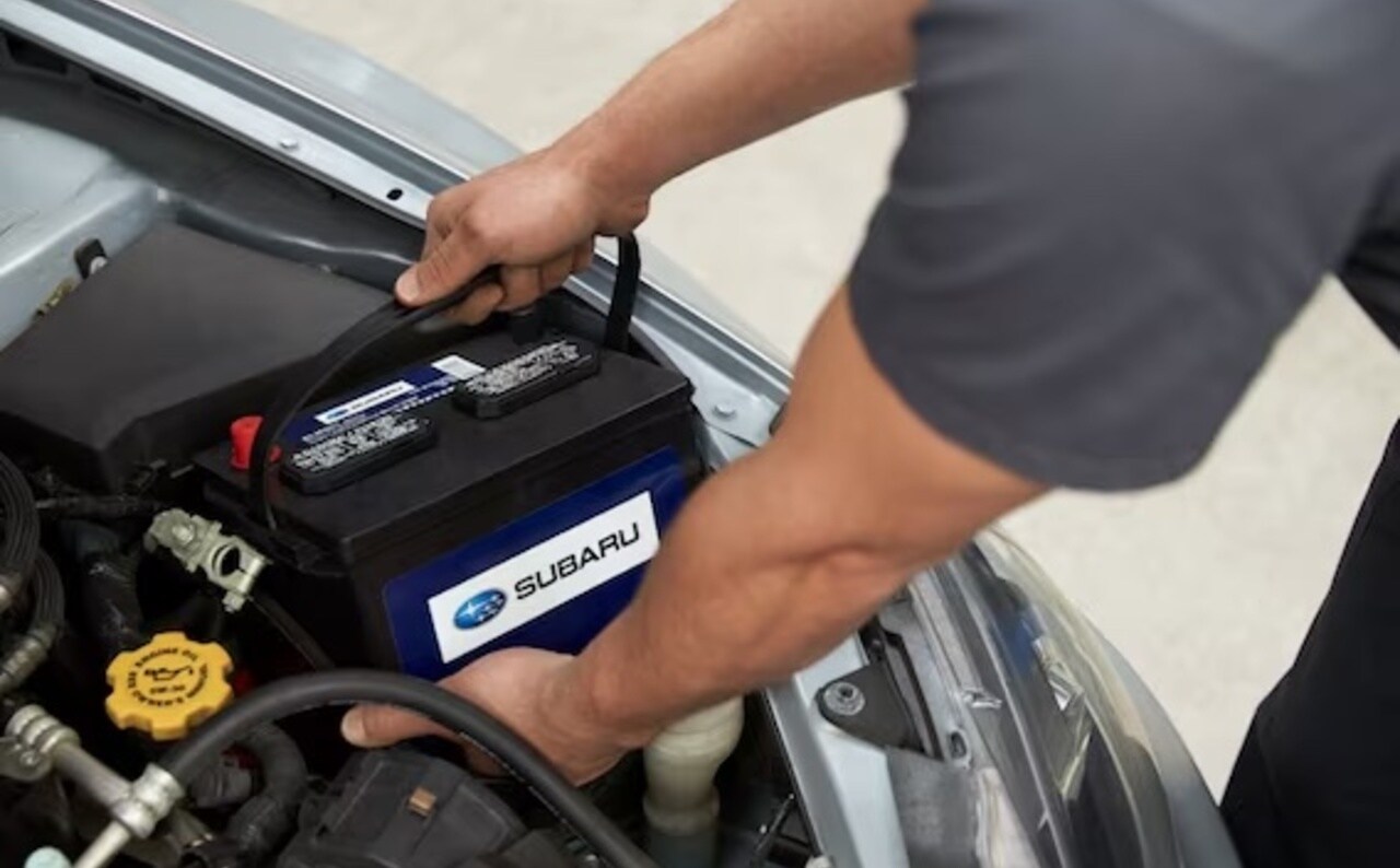 Man holding Subaru Battery.png Man holding Subaru Battery