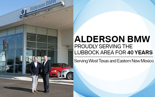 Alderson Employees in front of dealership.jpg