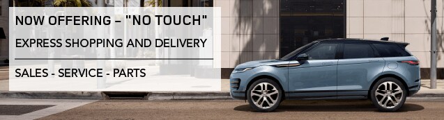 NOW OFFERING NO TOUCH EXPRESS SHOPPING AND DELIVERY. SALES, SERVICE AND PARTS. BLUE RANGE ROVER EVOQUE DRIVING THROUGH CITY.Â