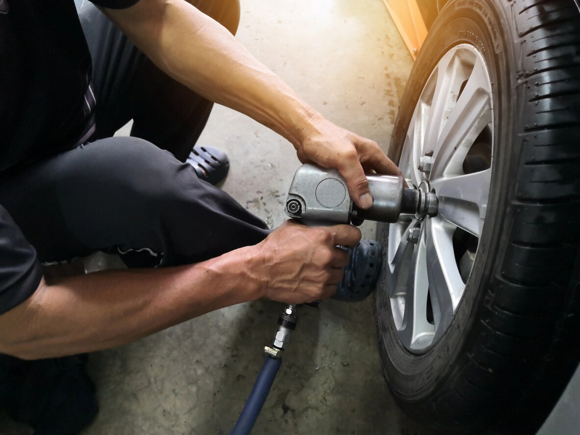 Technician working on tires