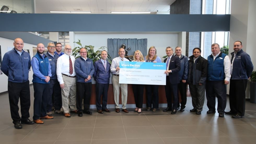Joan DeCotis Check Presentation.JPG