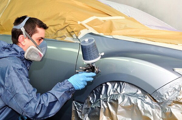 iStock_WorkerPaintingACarSmall.jpg