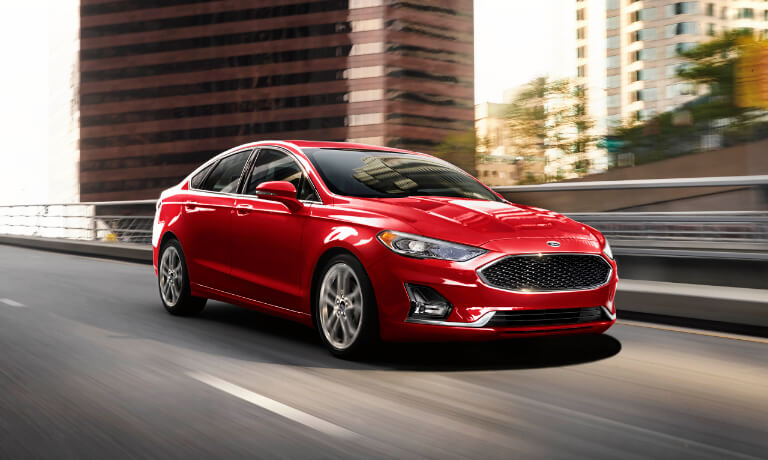 2020 Ford Fusion driving through a city