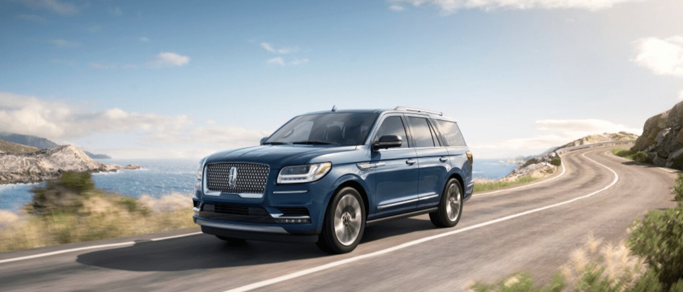 2019 Lincoln Navigator driving by water exterior view