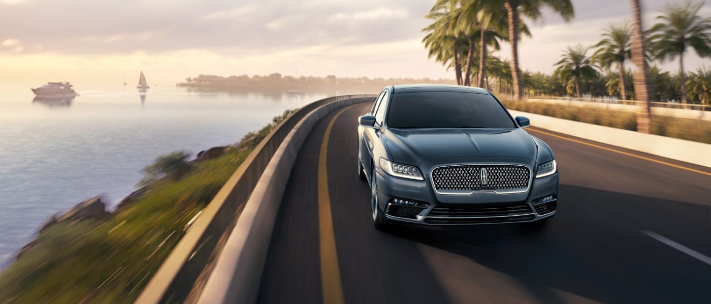 2019 Lincoln Continental driving by ocean