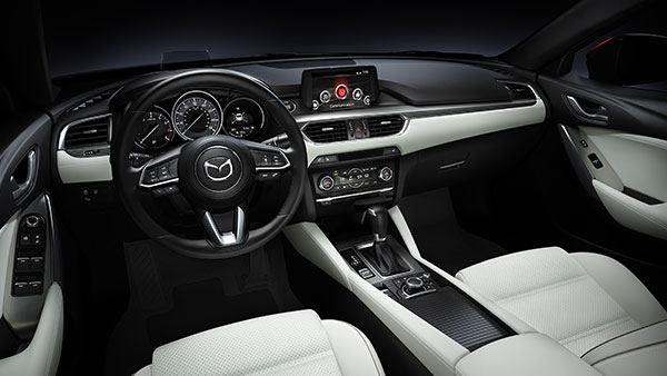 2018-mazda-3-sedan-interior-side-white.jpg