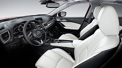 2018-mazda-3-sedan-interior-side-white.jpg