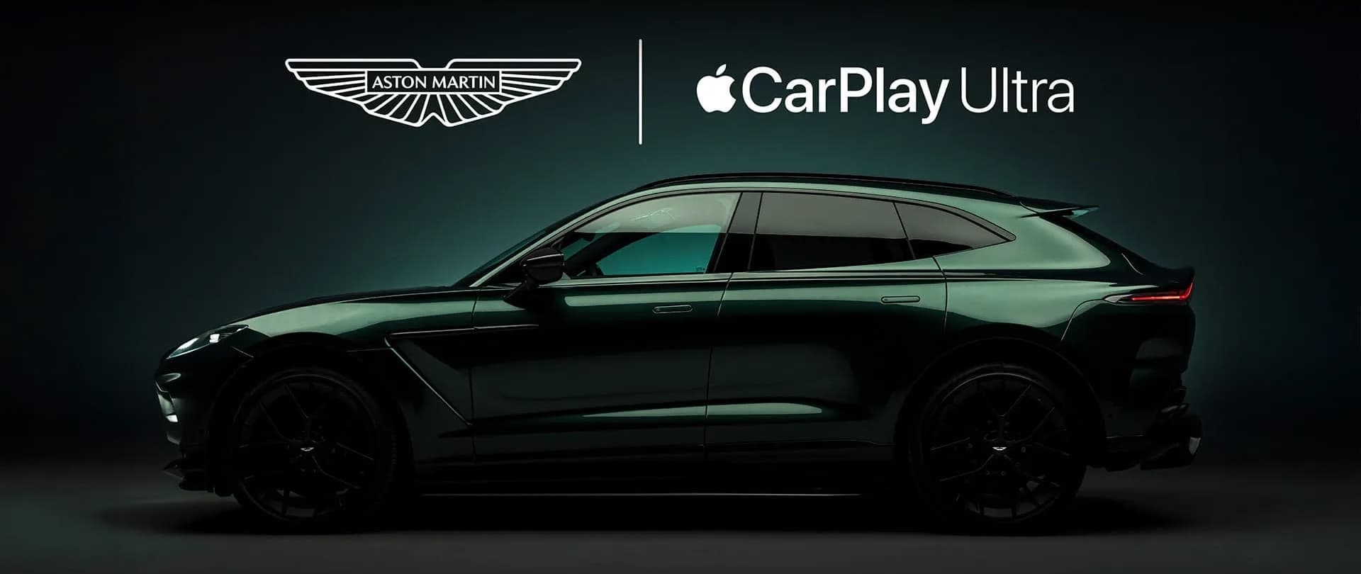 Side view of an Aston Martin DBX707 with the Aston Martin and Apple CarPlay Ultra logo above