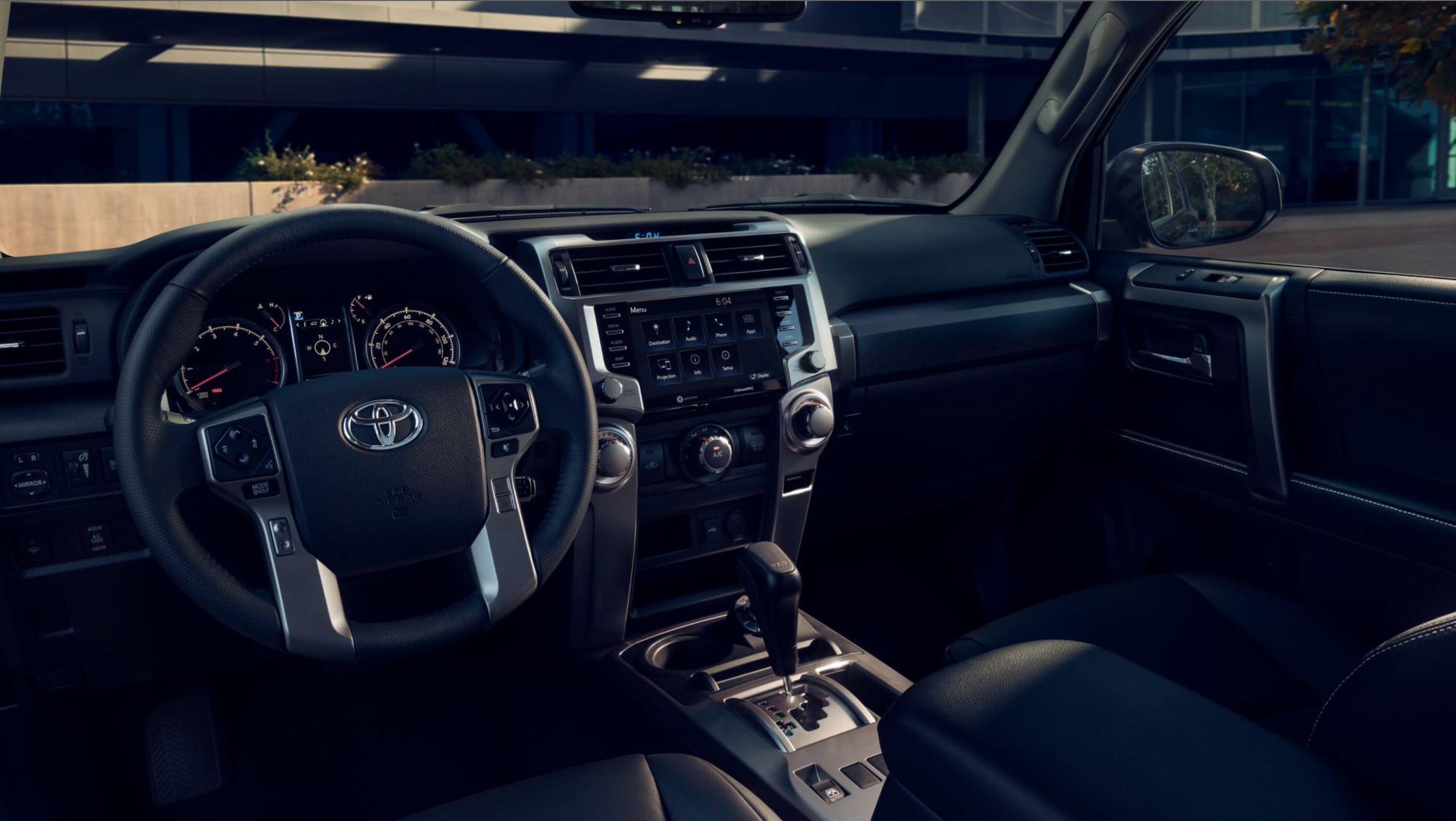 New 2024 Toyota 4Runner TRD Sport interior shown in Black SofTex® trim Near Bryan, TX.png