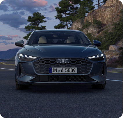 Audi A5 front view with LED headlights on cliff road