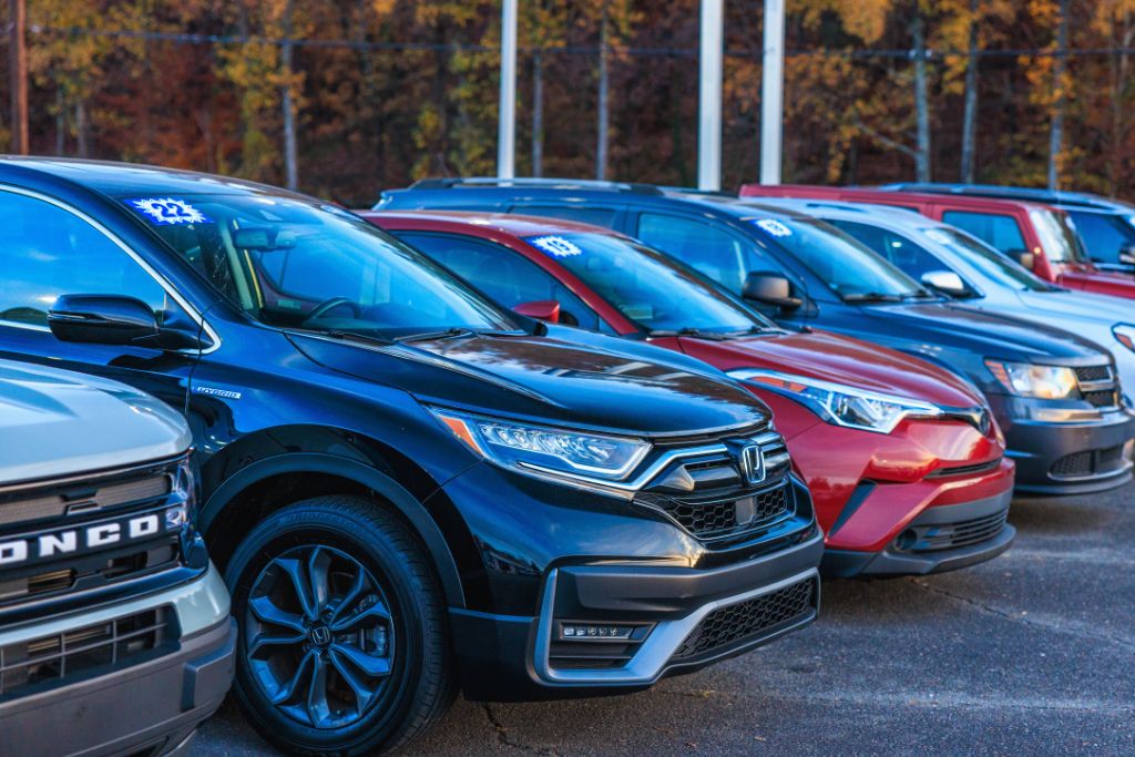 used-cars-asheville-nc.jpg Row of quality used cars in Asheville for sale lined up on the used car dealership lot