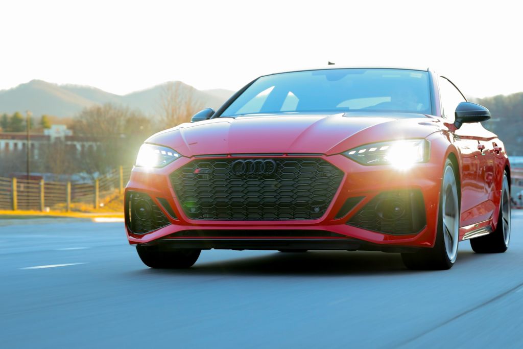 audi-rs5-sportback.jpg Red Audi RS5 for sale, shown in red, in motion on the streets of Asheville, NC