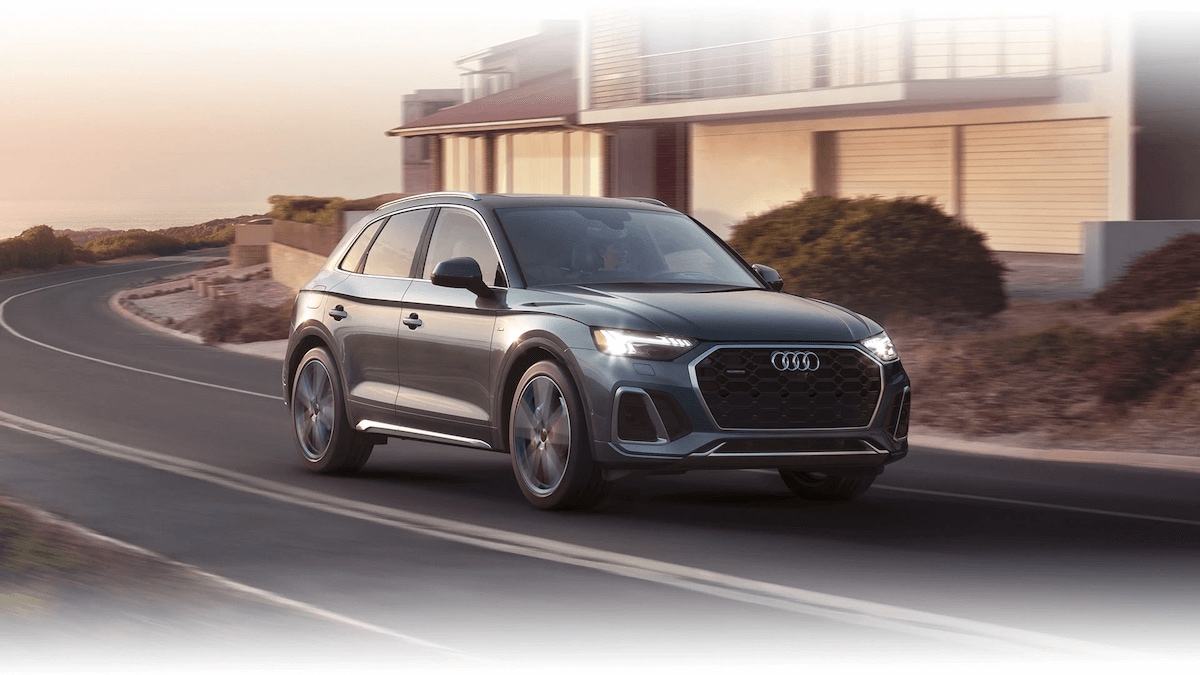 Audi Q5 driving down the road