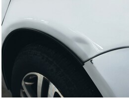 Small ding in car fender