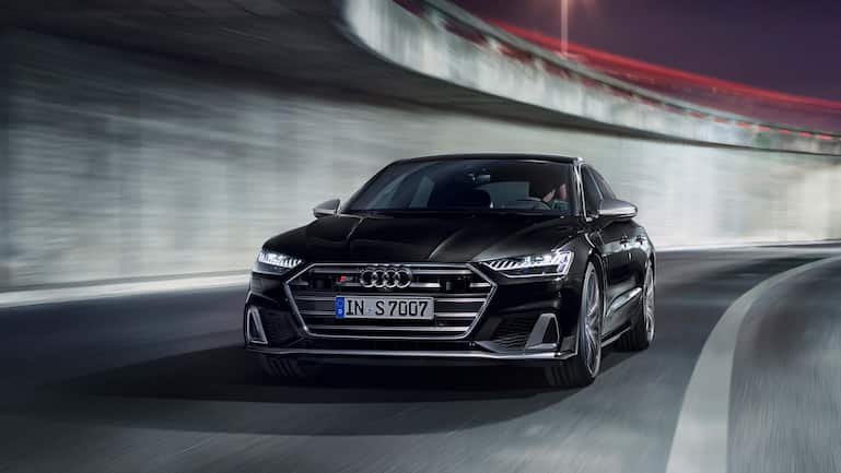 black Audi A7 driving down an offramp
