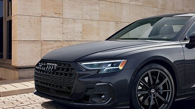 black Audi A8 parked, grill featured