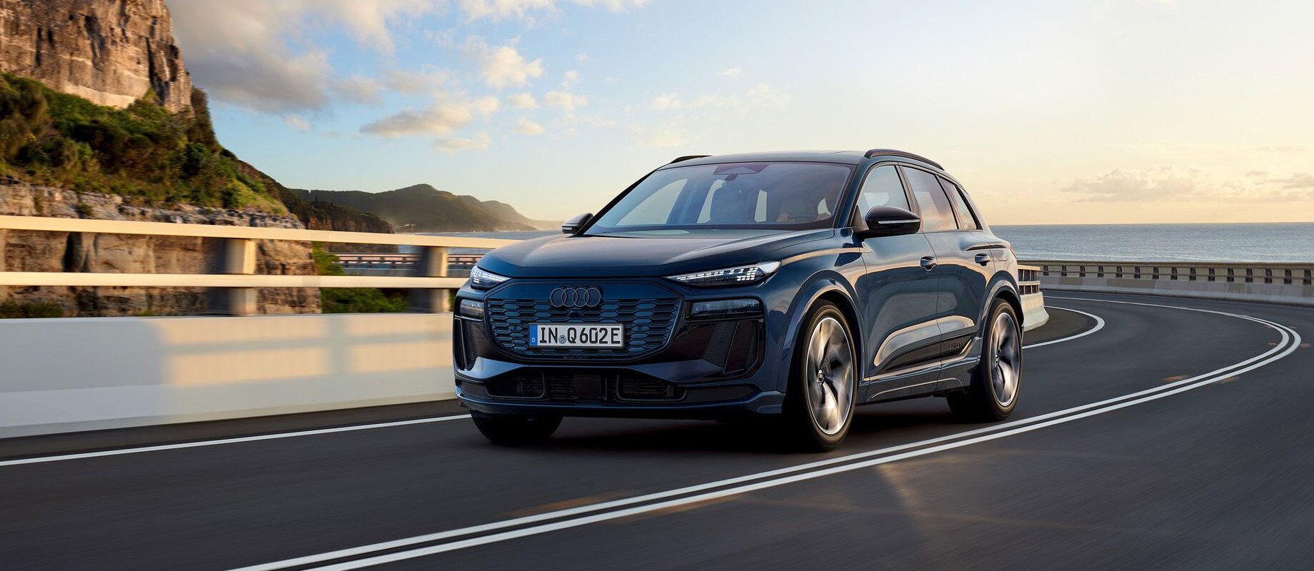 2025 Audi Q6 2025 Audi Q6 Driving Down the Highway front view