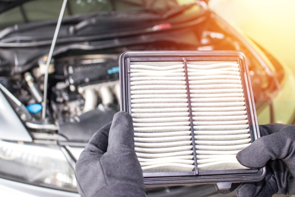 Freehold, NJ Mechanic Holding Air Filter