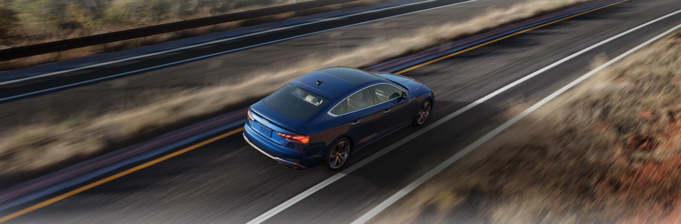 Blue 2021 Audi A5 on highway