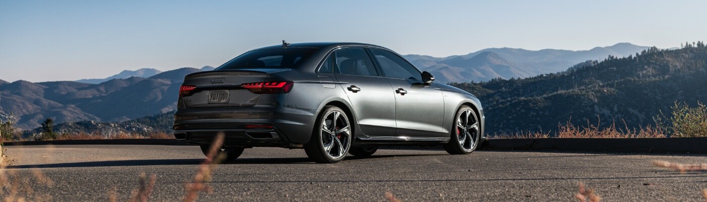 Audi A4 Grey Audi A4 parked in near mountain view