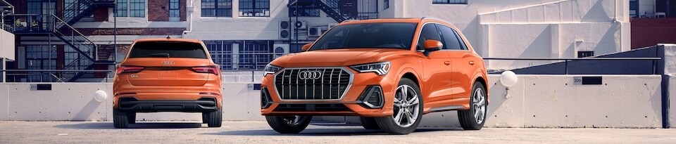 Two 2019 Audi Q3 SUVs, front and back