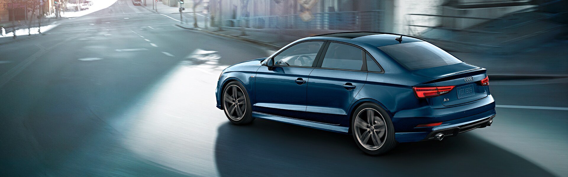 the 2020 Audi Q3 vs. the 2020 Mercedes-Benz GLA at Audi Owings Mills | Blue 2020 Audi A3 Driving Around Bend in City the 2020 Audi Q3 vs. the 2020 Mercedes-Benz GLA at Audi Owings Mills | Blue 2020 Audi A3 Driving Around Bend in City