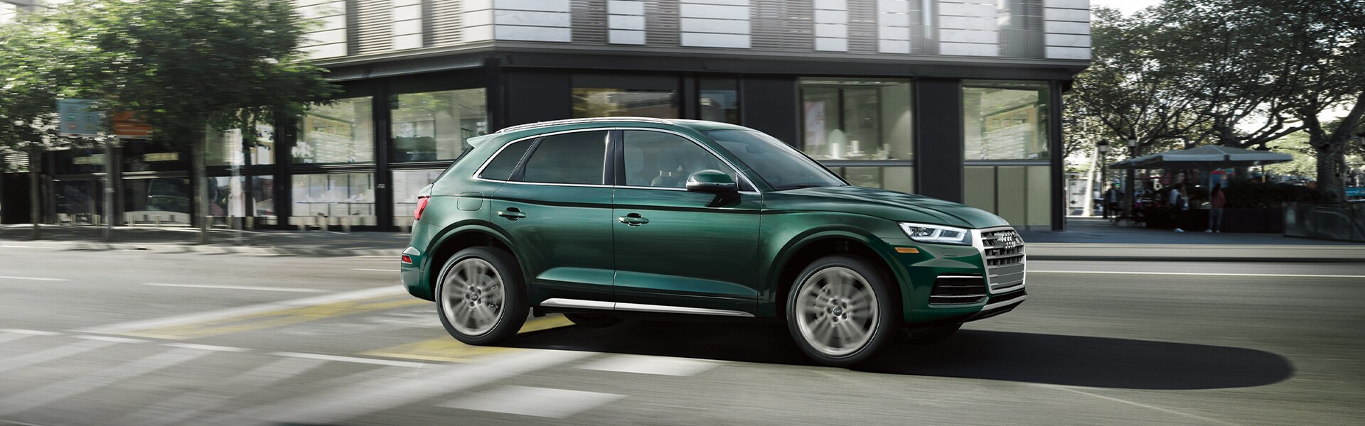 Comparison of the 2020 Audi Q5 & the 2020 Mercedes-Benz GLC at Audi Owings Mills | Green 2020 Audi Q5 Driving Through City Comparison of the 2020 Audi Q5 & the 2020 Mercedes-Benz GLC at Audi Owings Mills | Green 2020 Audi Q5 Driving Through City
