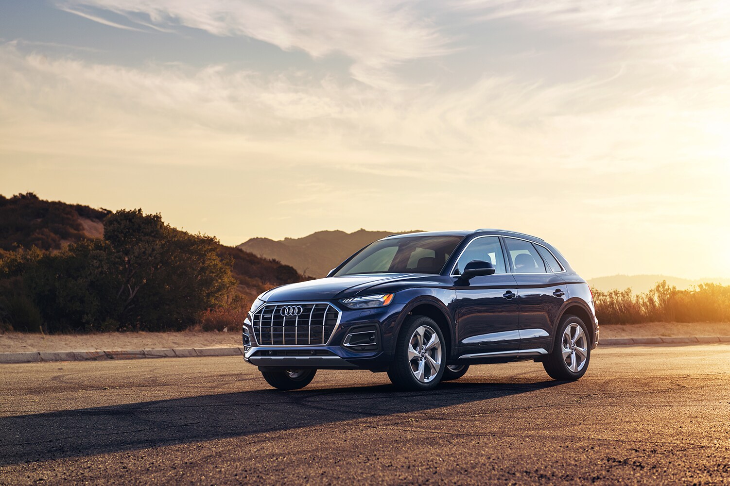 Model Features of the 2021 Audi Q5 at Audi Owings Mills | 2021 Audi Q5 parked at sunset