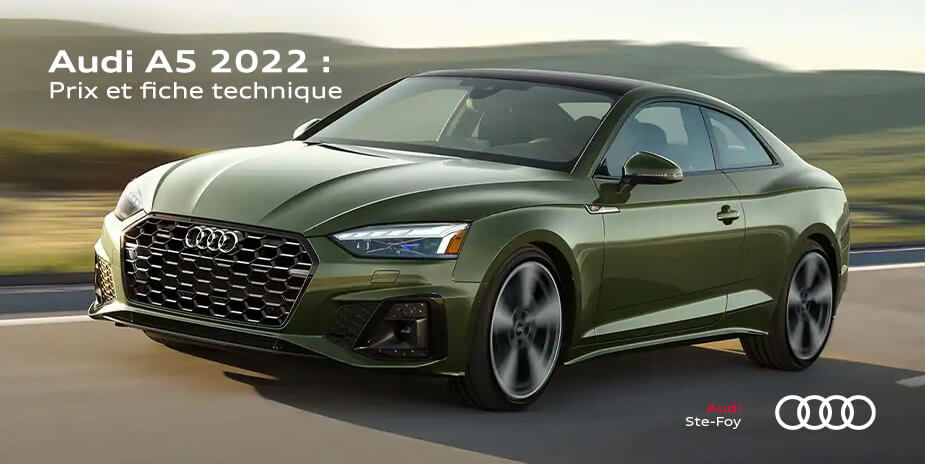 Audi A5 2022 vert district métallisé Une Audi A5 coupé 2022 de couleur vert district métallisé roulant sur une route