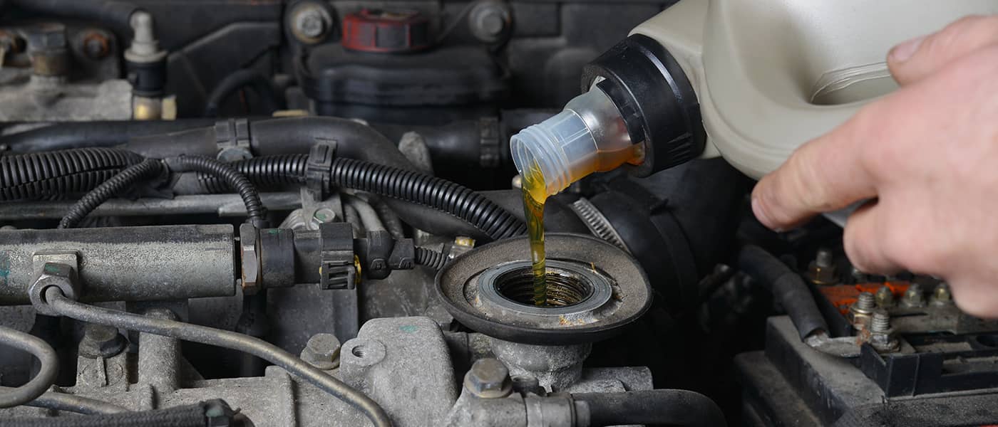 Man changing Engine Oil