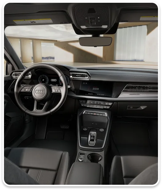 Audi A3 cockpit seen from above with the steering wheel and MMI touch display