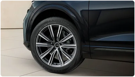 Close-up of an Audi Q8 alloy wheel and front fender