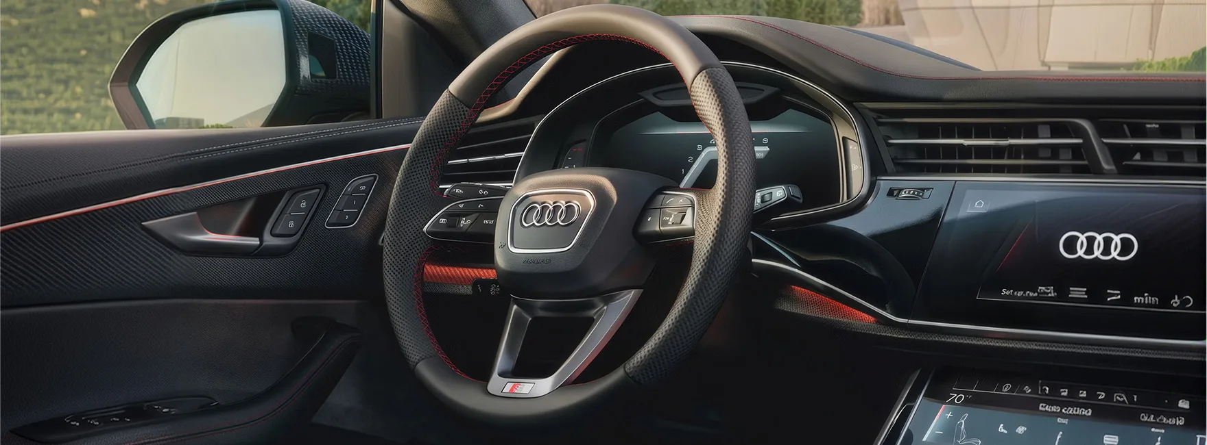 Audi Q8 steering wheel in front of the 12.3-inch virtual cockpit plus display