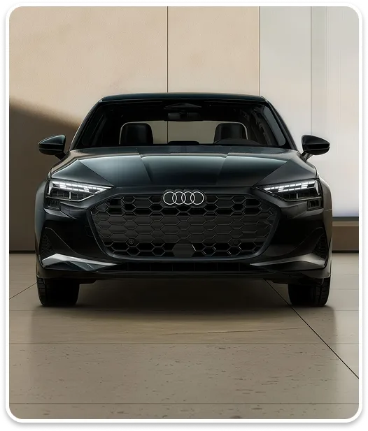 Front view of a black Audi A3 showing its Singleframe grille and headlights