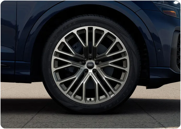 Close-up of a 10-Y-spoke Audi Q8 wheel in a neodymium gold finish