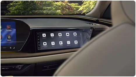 Audi Q5 dashboard with the head-up display and the MMI passenger display lit