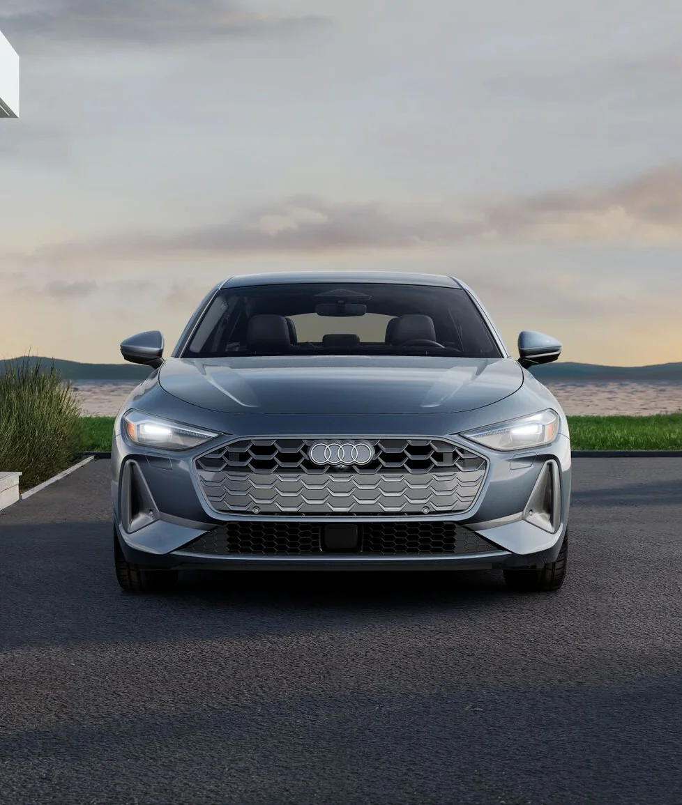 Front view of a grey Audi A5 by the water