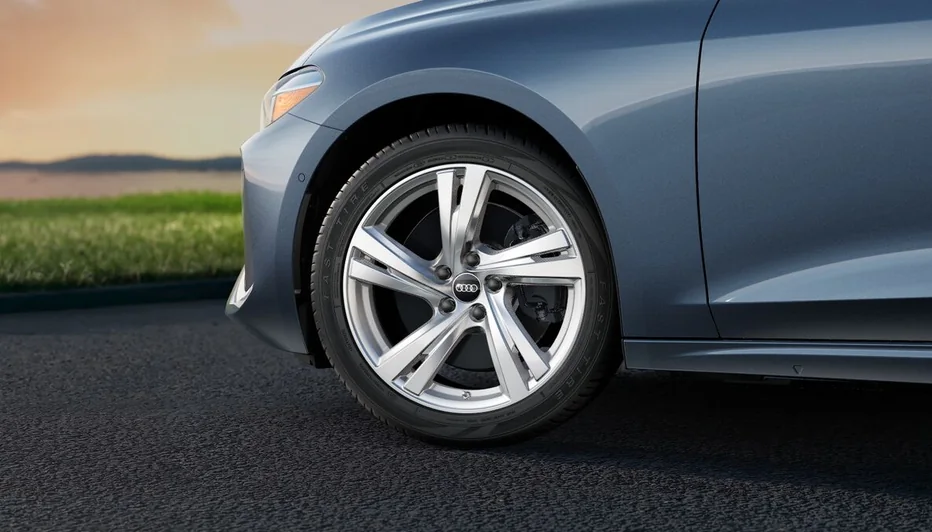Close-up of an Audi A5 alloy wheel and front fender