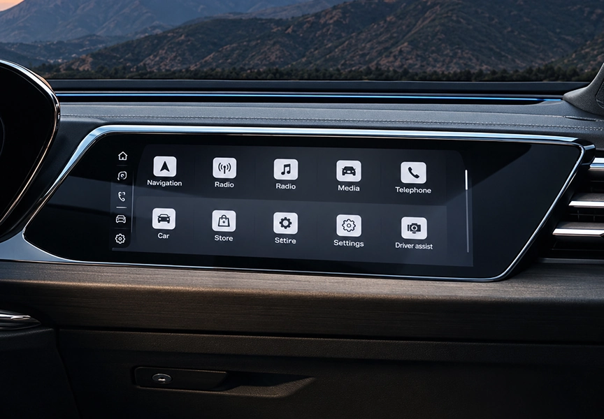 MMI passenger display set into the Audi A6 dashboard showing navigation, radio and media icons
