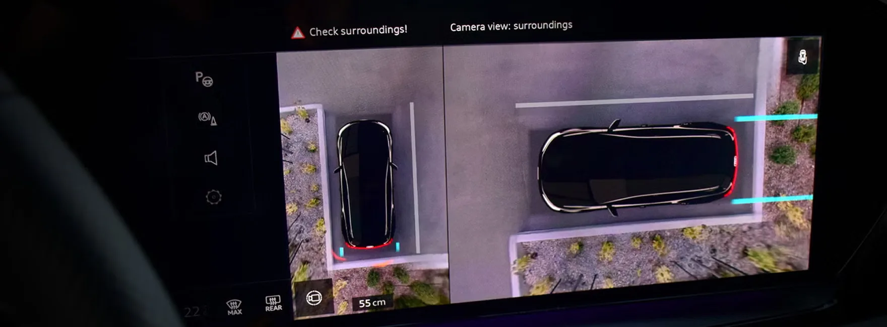 Audi Q5 MMI display showing the top view camera system while parking