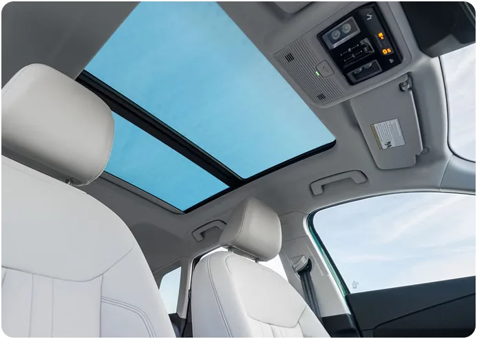 Open panoramic sunroof seen from inside the Audi Q3 cabin
