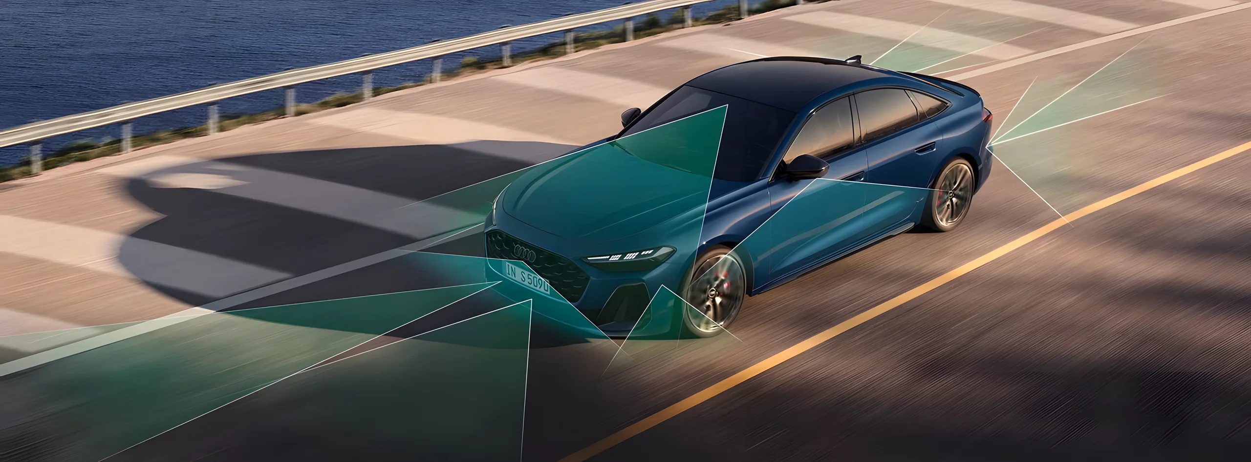 Blue Audi A5 on a highway with its driver assistance sensor fields shown in green