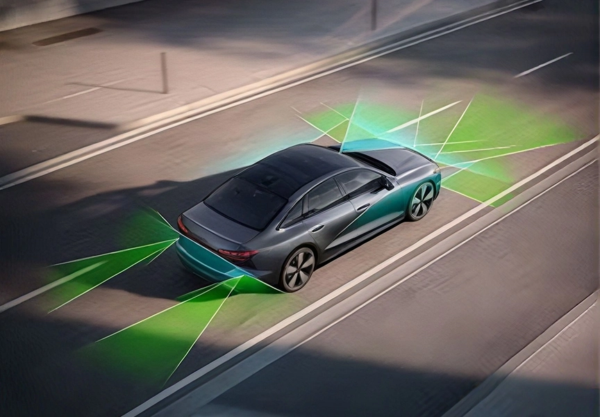 Grey Audi A6 Sedan on a highway with green sensor beams illustrating adaptive cruise assist