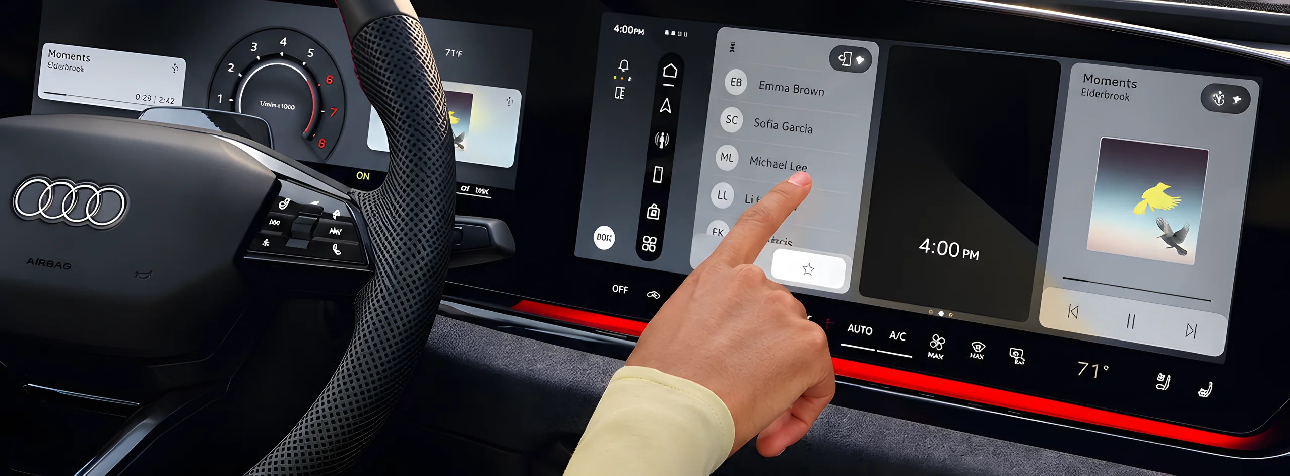 Driver using the MMI touch display in the Audi A5 wraparound cockpit